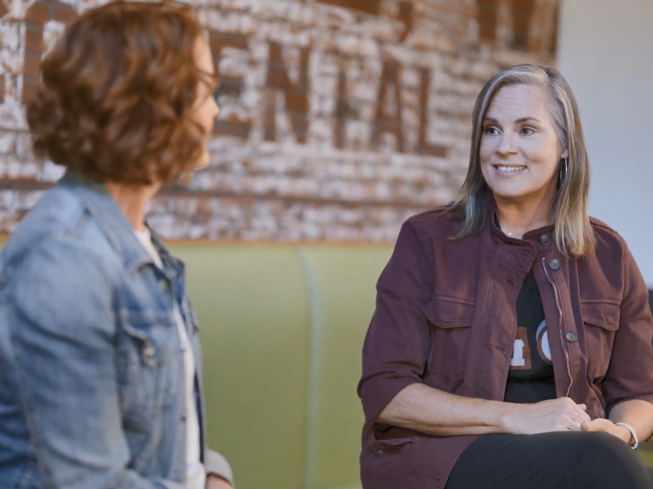 Julia White and Dayna Eberhardt talking.