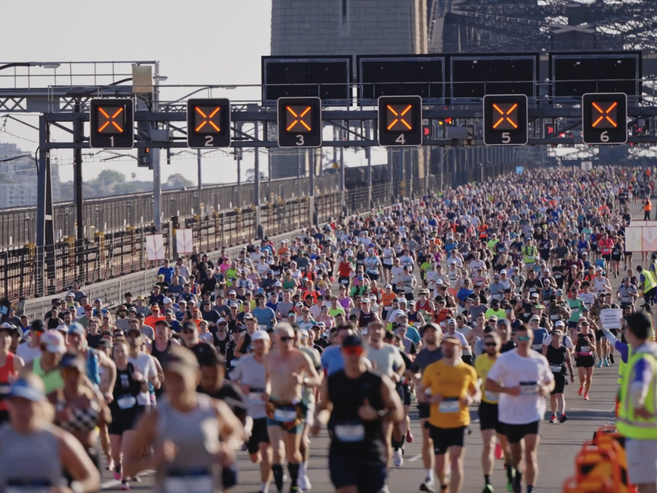 Large group of people running a marathon