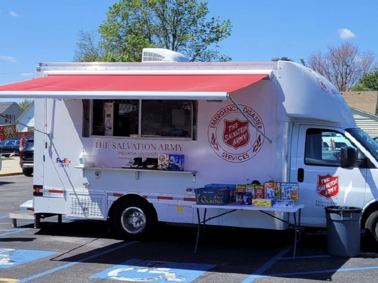 FedEx canteen truck set up with a food and drink station 