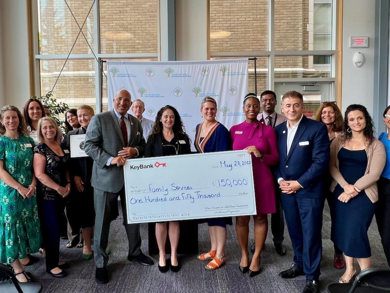Joined by representatives from Dutchess County and Senator Rolison’s office, KeyBank and Family Services celebrate a gift of $150,000 to support teen mental health and wellness programming.