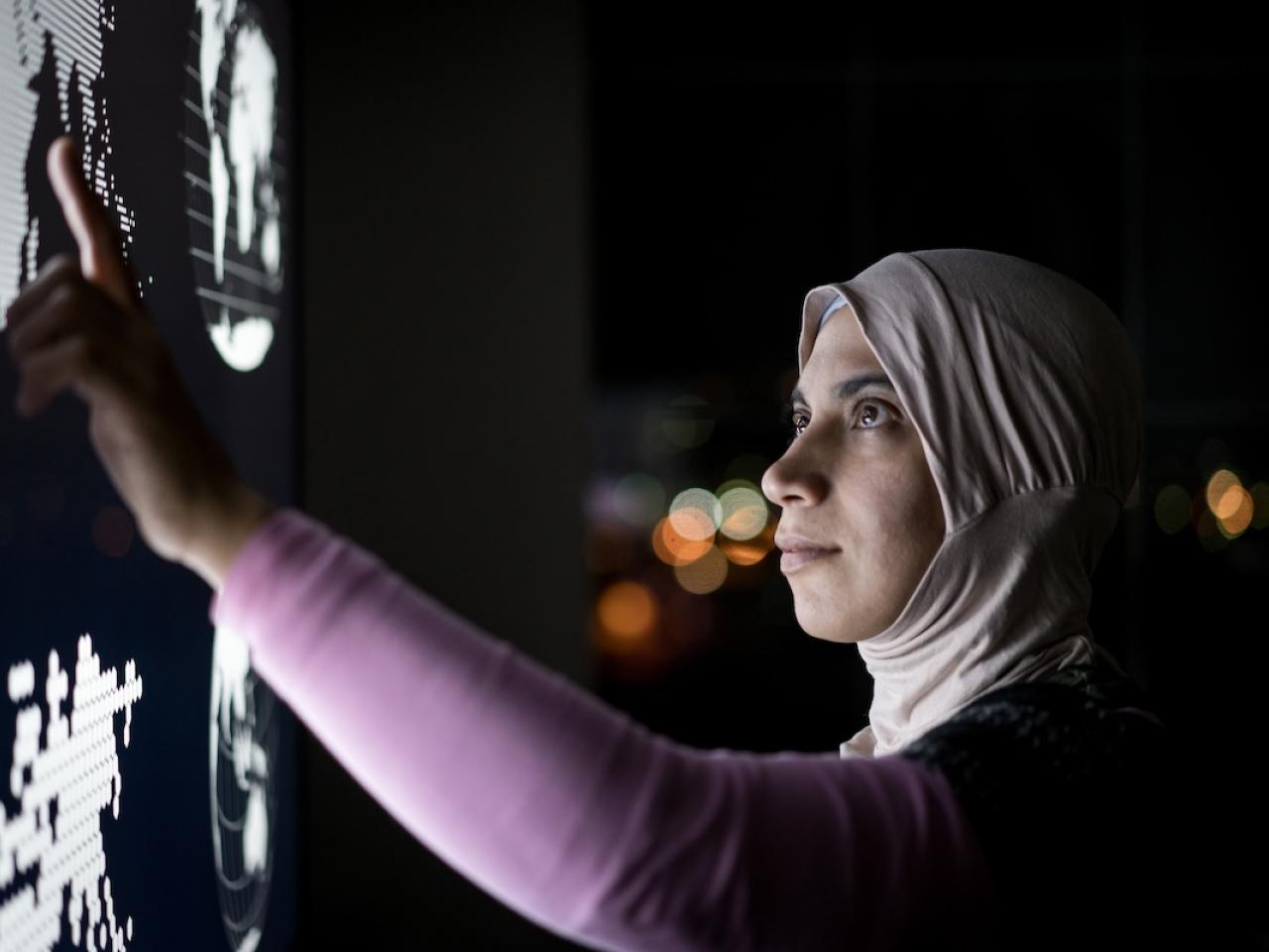 person looking at a screen