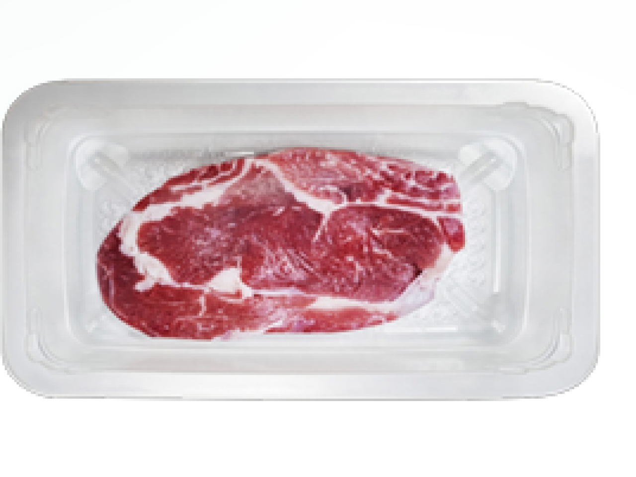 A cut of meat in a clear sealed package.