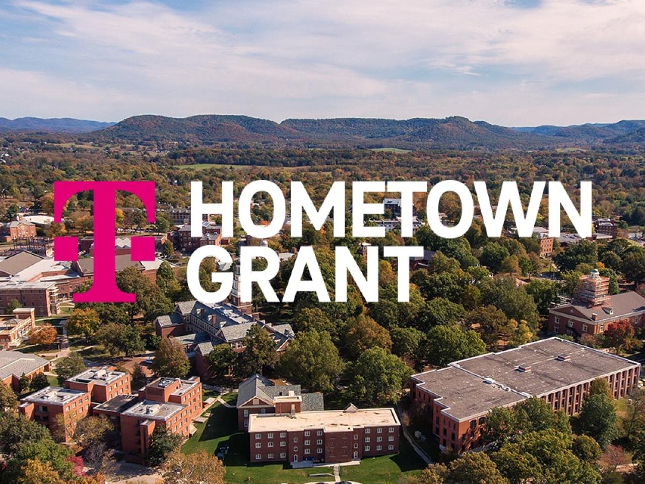 Aerial view of a town "Hometown Grant" and TMobile logo on top.