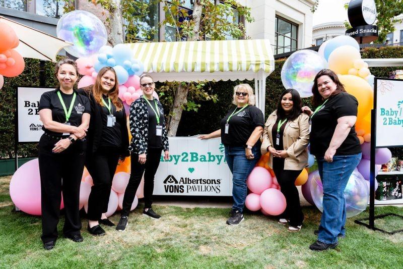 Group posing at Albertsons' SoCal Mother's Day event