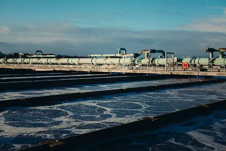 Large pipes outside at a processing facility