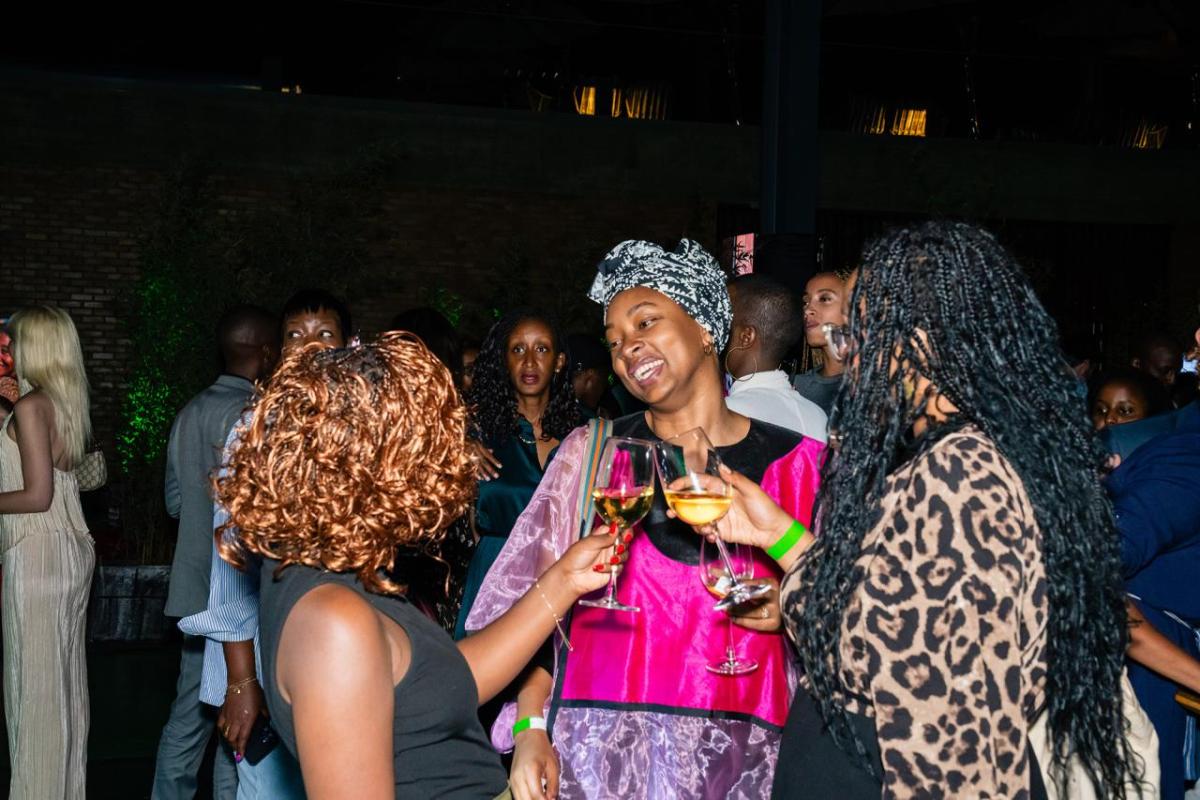 Attendees at Glow Hour (DJ set, celebration toast, & joyful connection)
