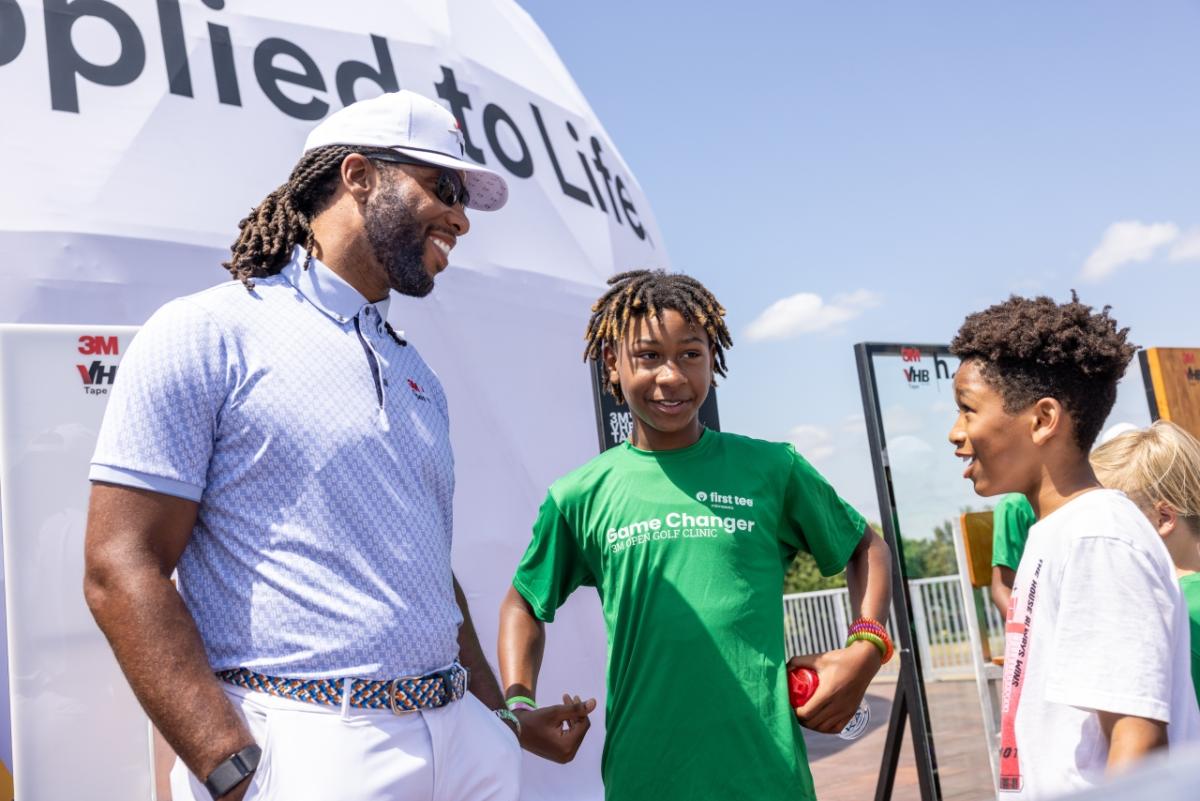 golfer with kids