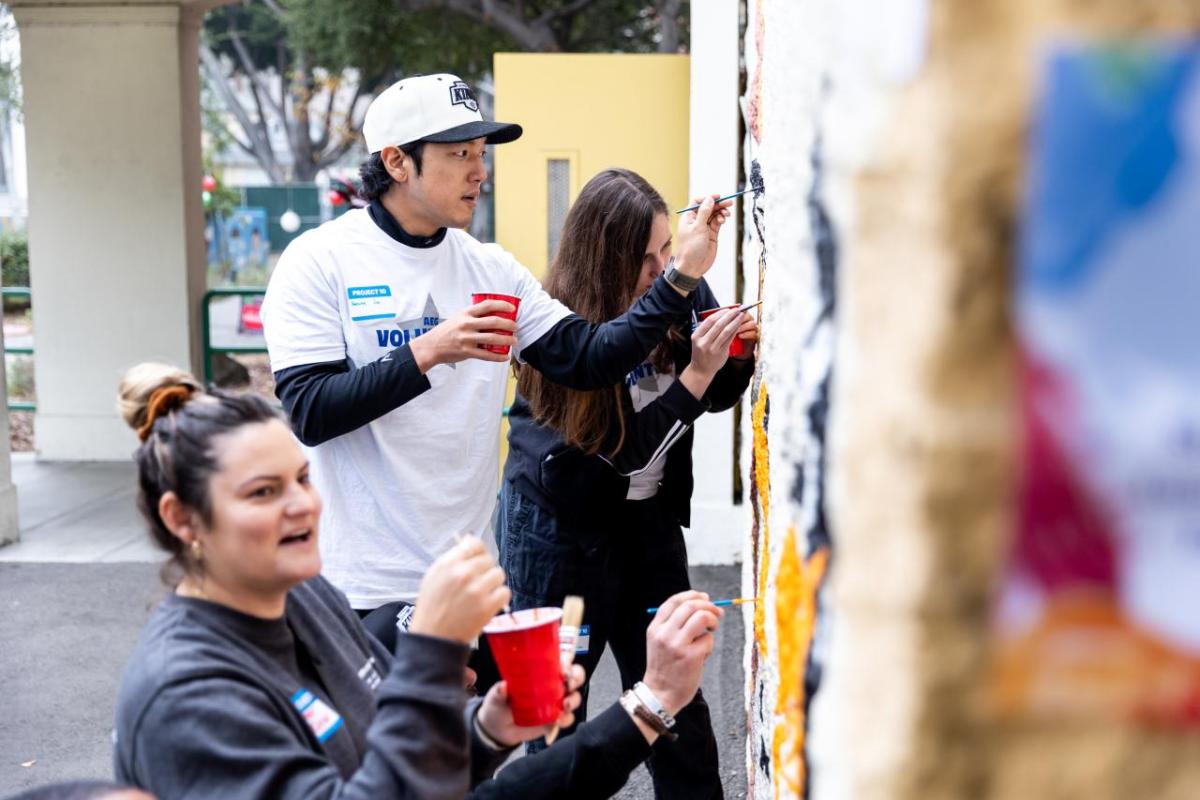 AEG volunteers in Los Angeles painted murals to beautify the campus.