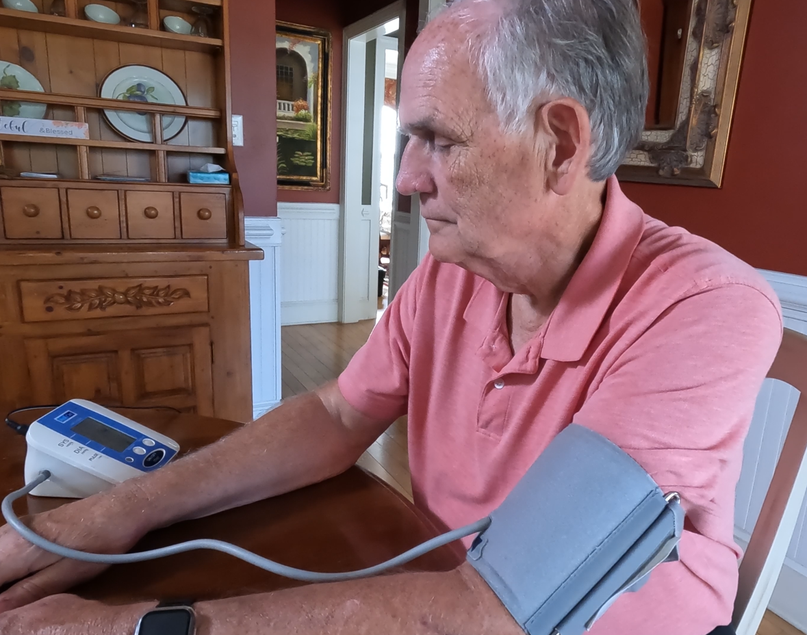 Paul Griffin checks his blood pressure at home