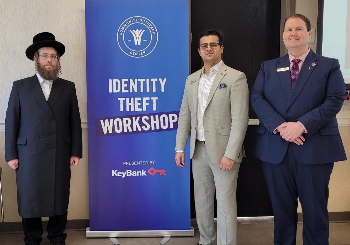 Community Outreach Center Executive Director Rabbi Hersh Horowitz with KeyBank’s Raza Hussain and Gary Wawrzycki.