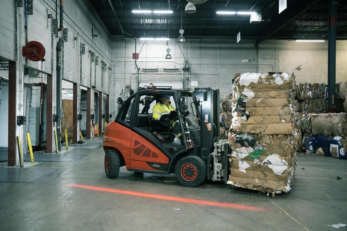 Recycling being loaded on forklift