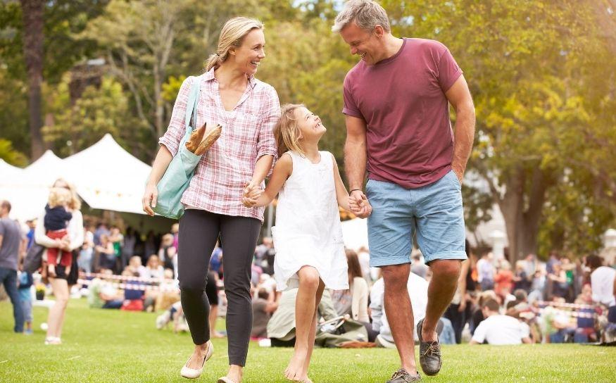A family enjoying an outside event