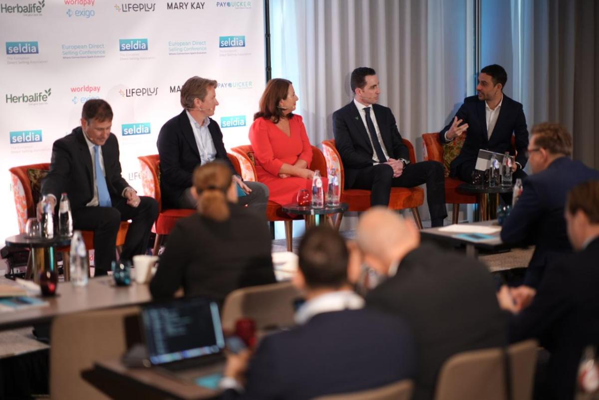 Ewa Kudlinska-Pyrz and others speaking on stage