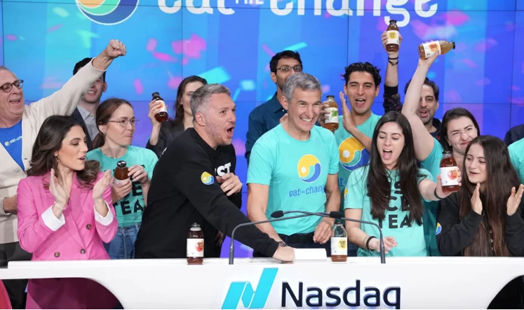 Seth and Spike ringing the bell at the Nasdaq