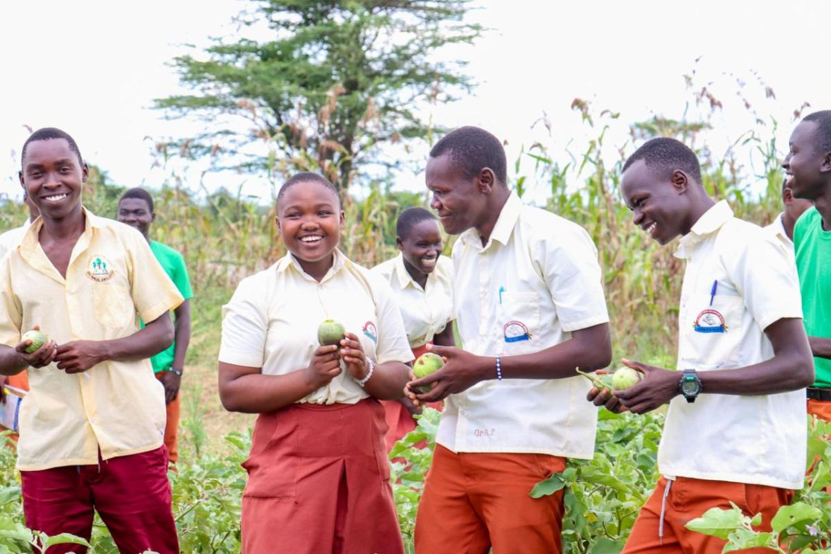 Patience and her fellow club members in the climate-smart school garden. 