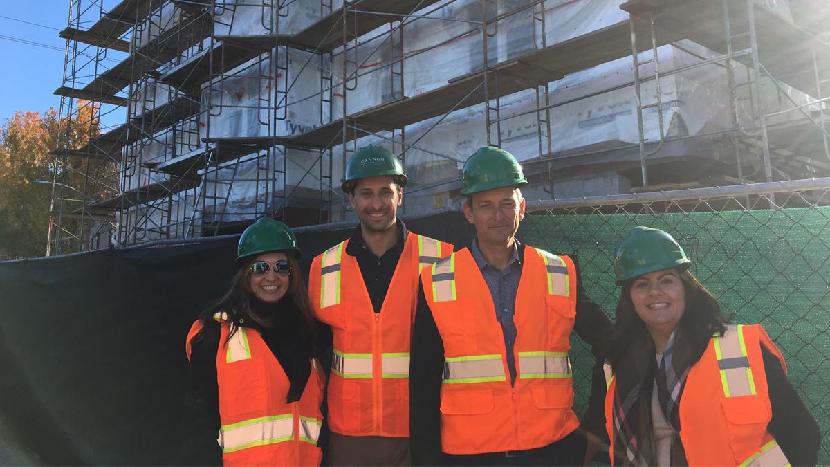 Lisa Gutierrez (right) at the construction site of La Vereda, a modular, affordable senior housing development in San Leandro, California.