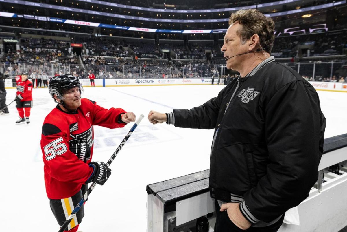 Vince Vaughn, Actor and Comedian, celebrated a goal with Mary Mullen of the Los Angeles Fire Department.