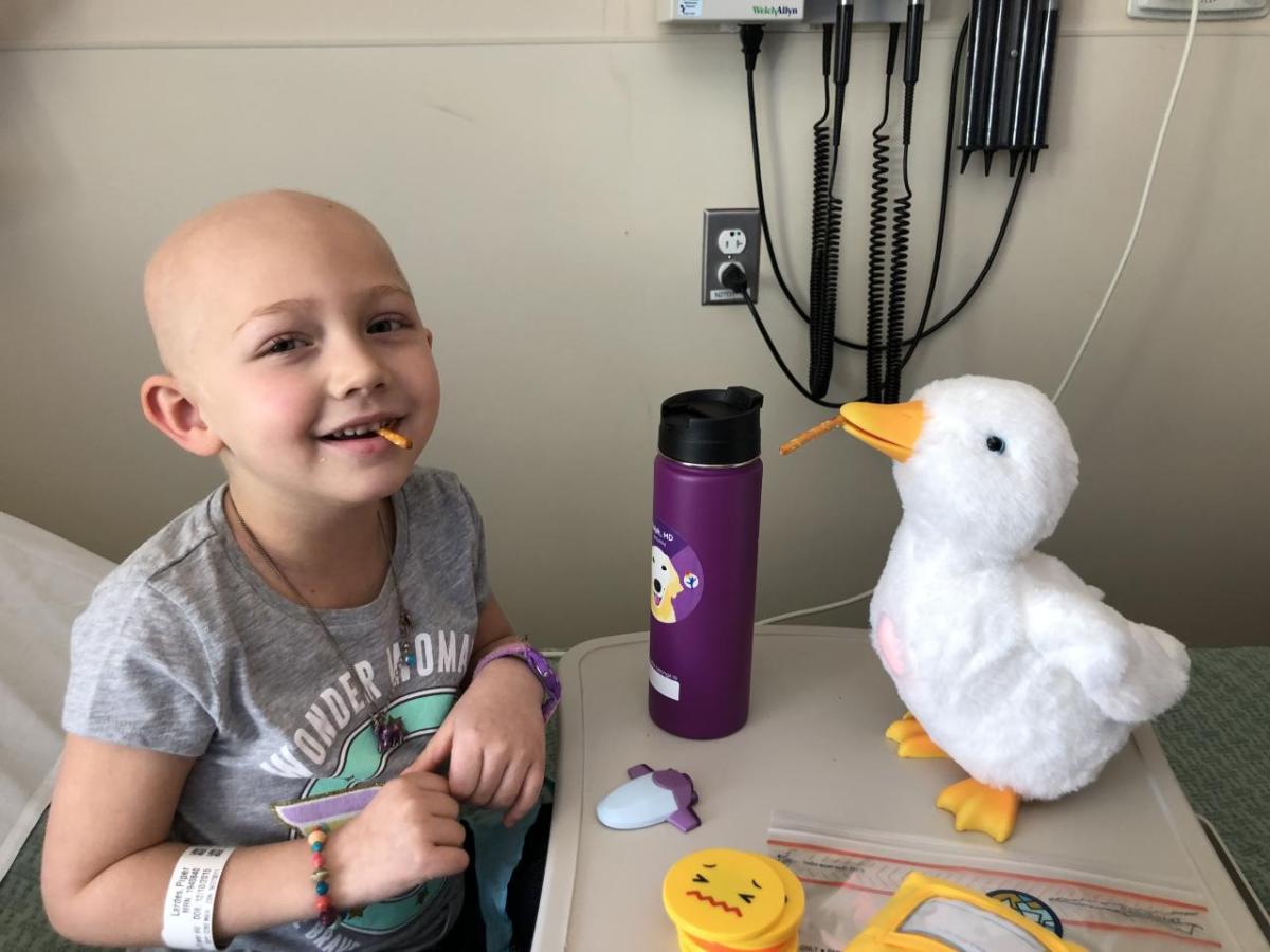 Piper shown with her Aflac Duck.