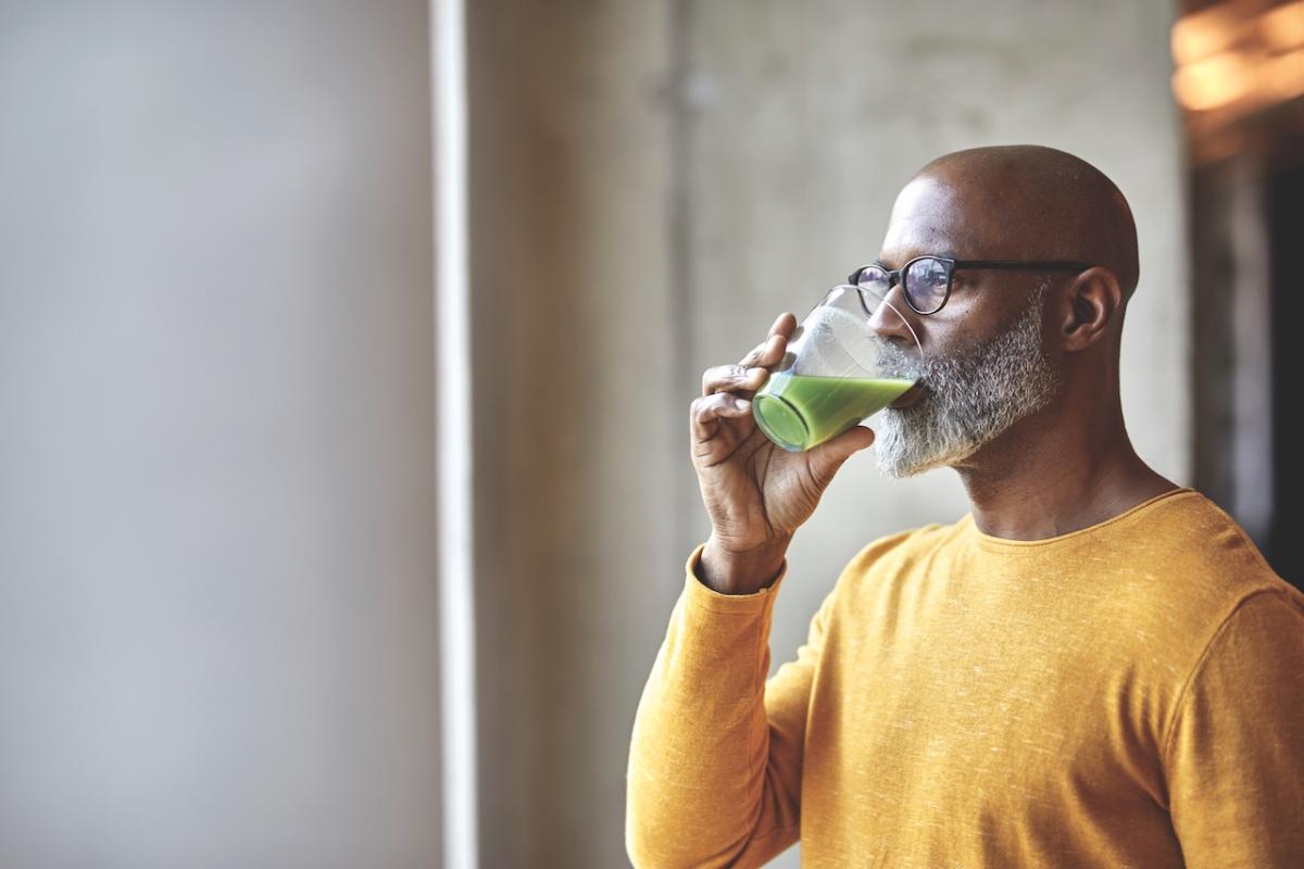 Tetra Pak image of man drinking juice