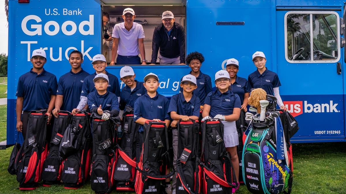 Pro golfer Collin Morikawa, in white shirt, with participants in the Youth on Course program.