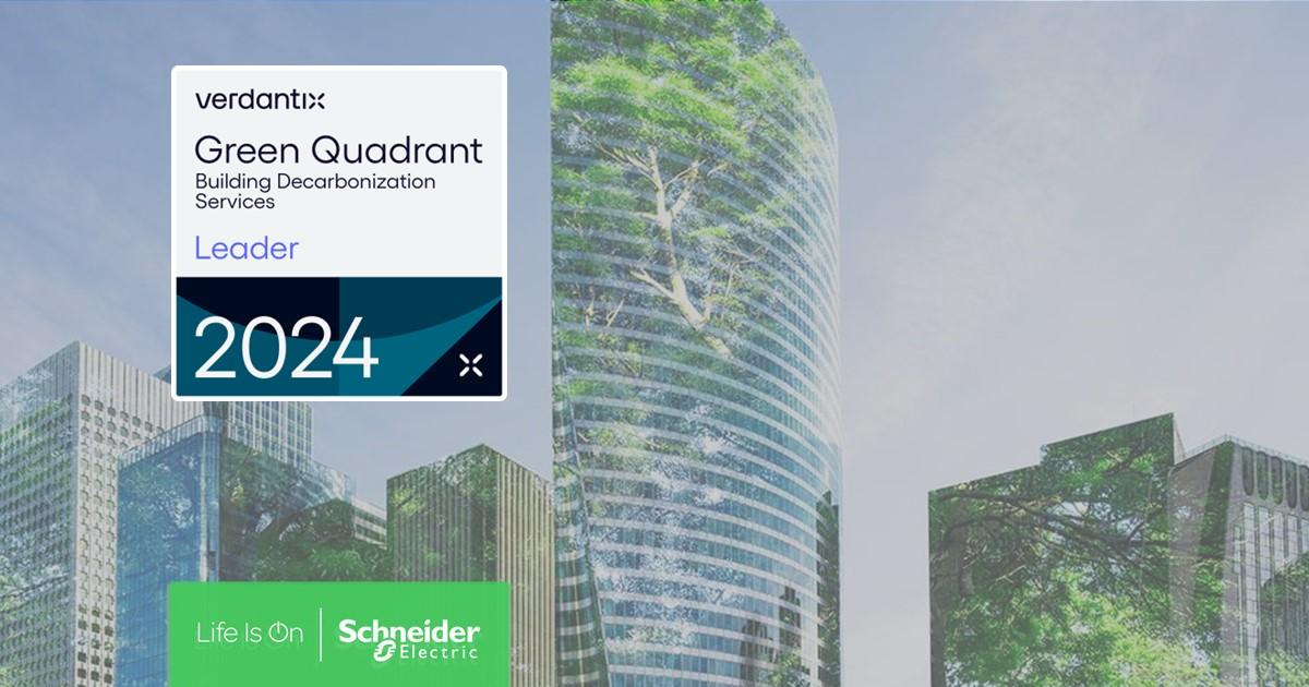 Tall building with the text "verdantix Green Quadrant Building Decarbonization Services Leader 2024"