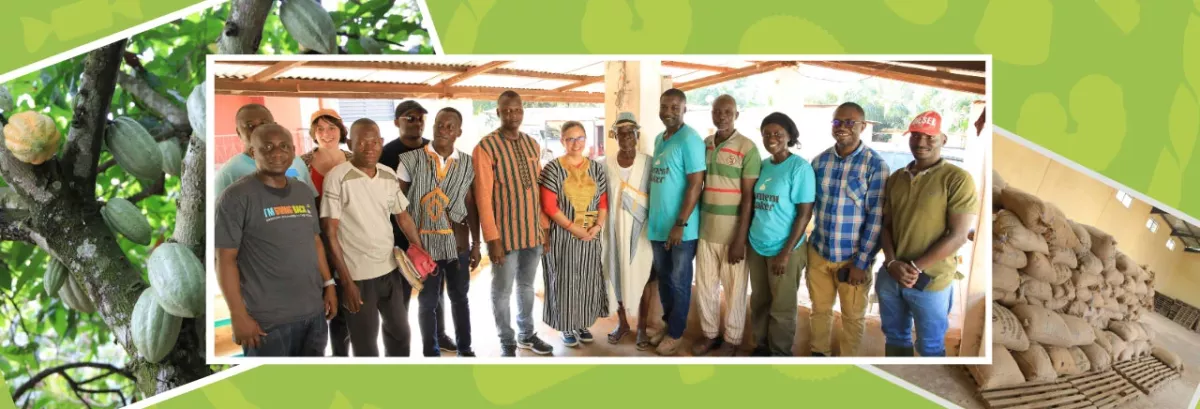 A group of people posed under a canopy.