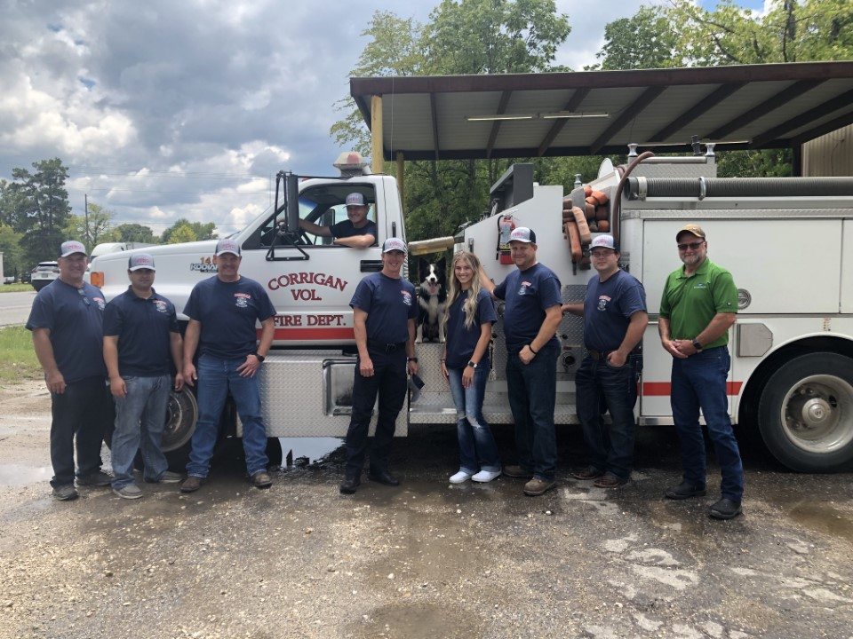 Corrigan Firefighters standing in front of truck