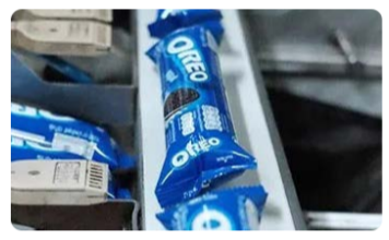 Close up of small oreo packets in a line.