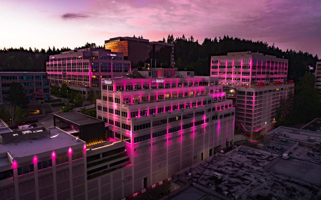 T-Mobile office building at dusk with pink exterior lighting