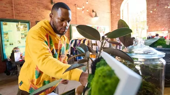 Michael Odulana in his shop