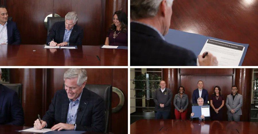 Collage of four photos of the CEO seated, signing a document at a large wood desk. A group of 5 people behind them.