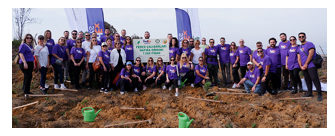 A group of volunteers posed outside