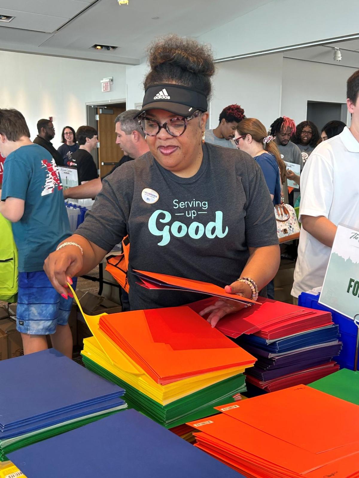 Volunteer getting supplies