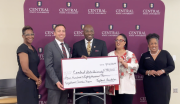 KeyBank and representatives from Central State University shown with a grant check.