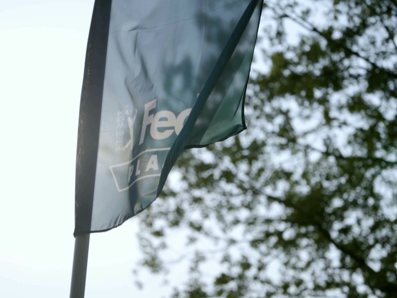 light blue FedExCup Playoffs flag