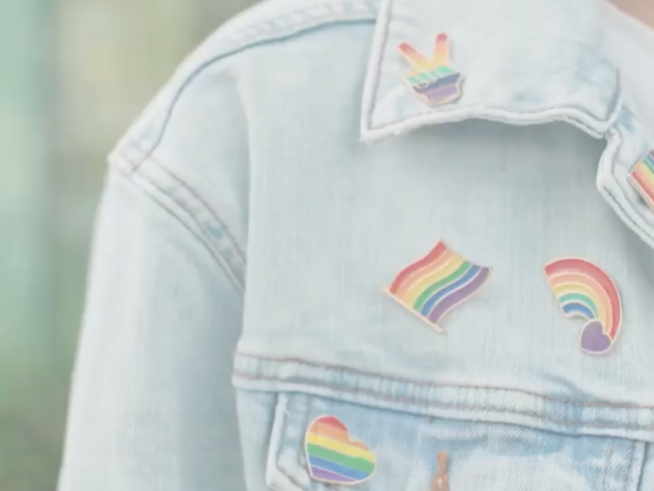 Jacket with Pride pins
