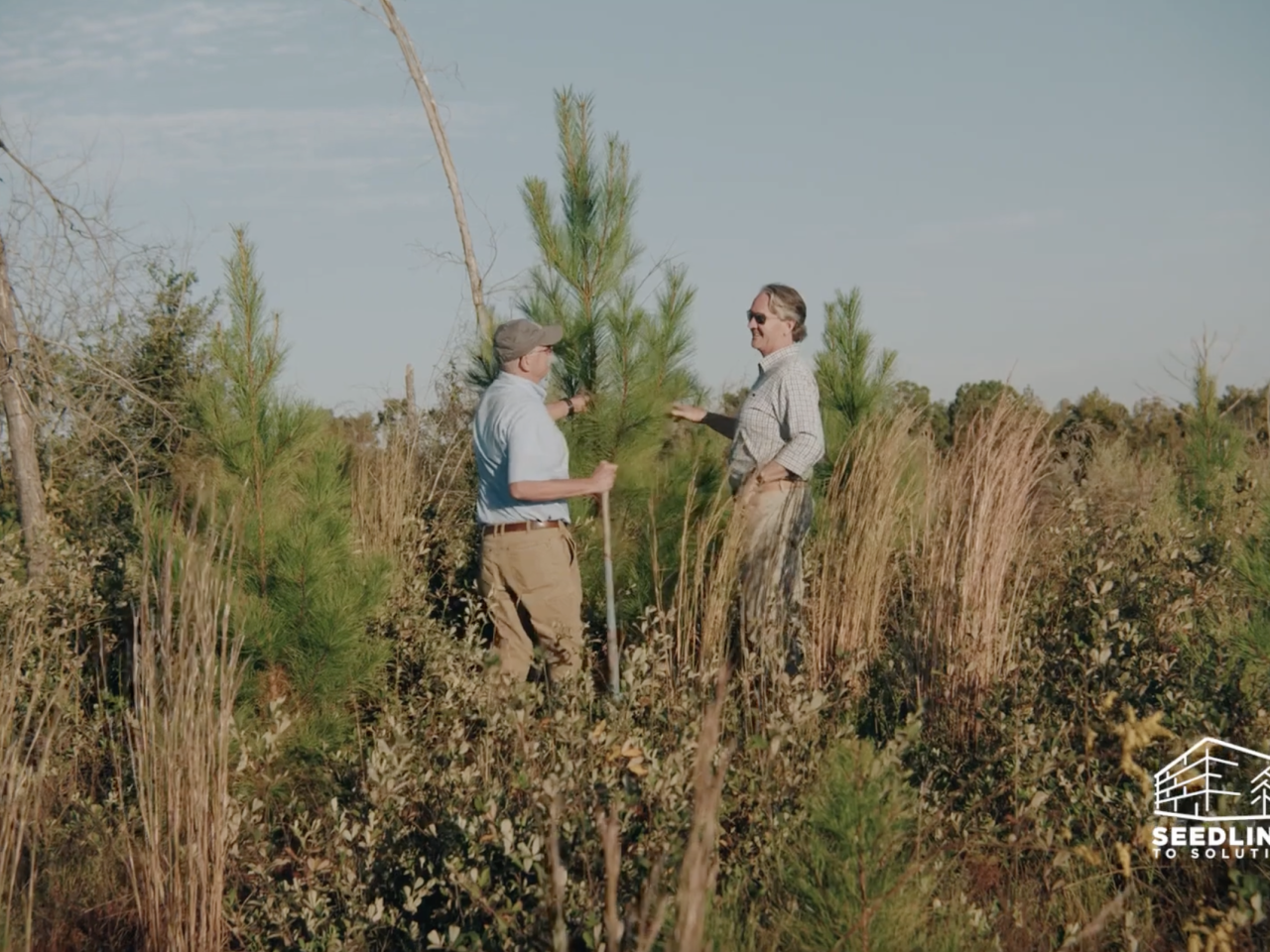 image of two men in a field
