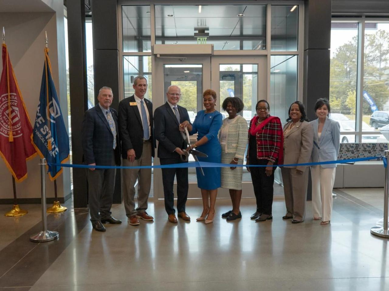 Group photo of the ribbon cutting