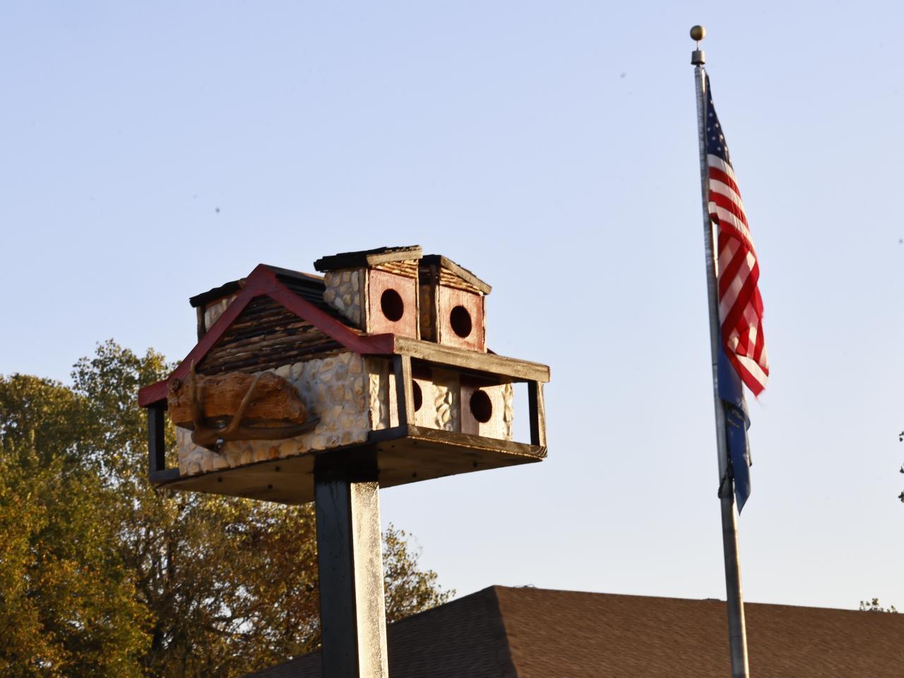 Birdhouse in front of American flag