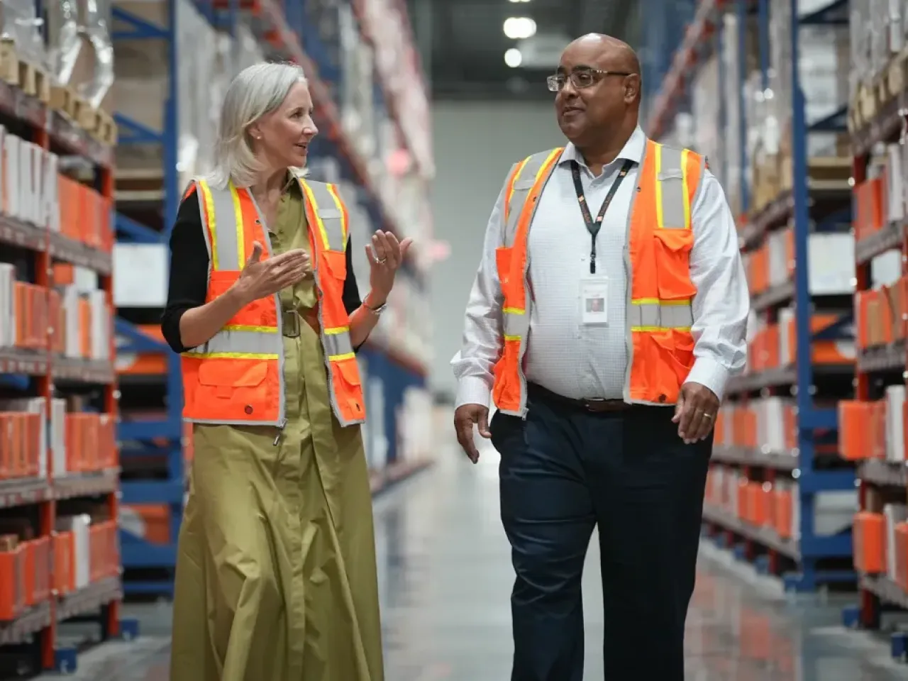 Direct Relief CEO Amy Weaver and Dr. Byron Scott, COO and President, on May 5, 2025, in Direct Relief's warehouse in Santa Barbara, California. (Lara Cooper/Direct Relief)