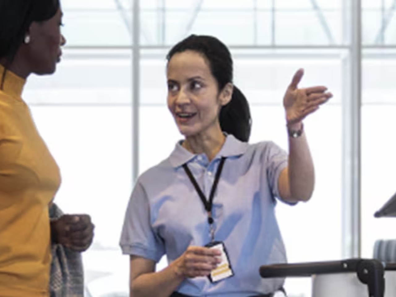 Two people shown having a discussion.