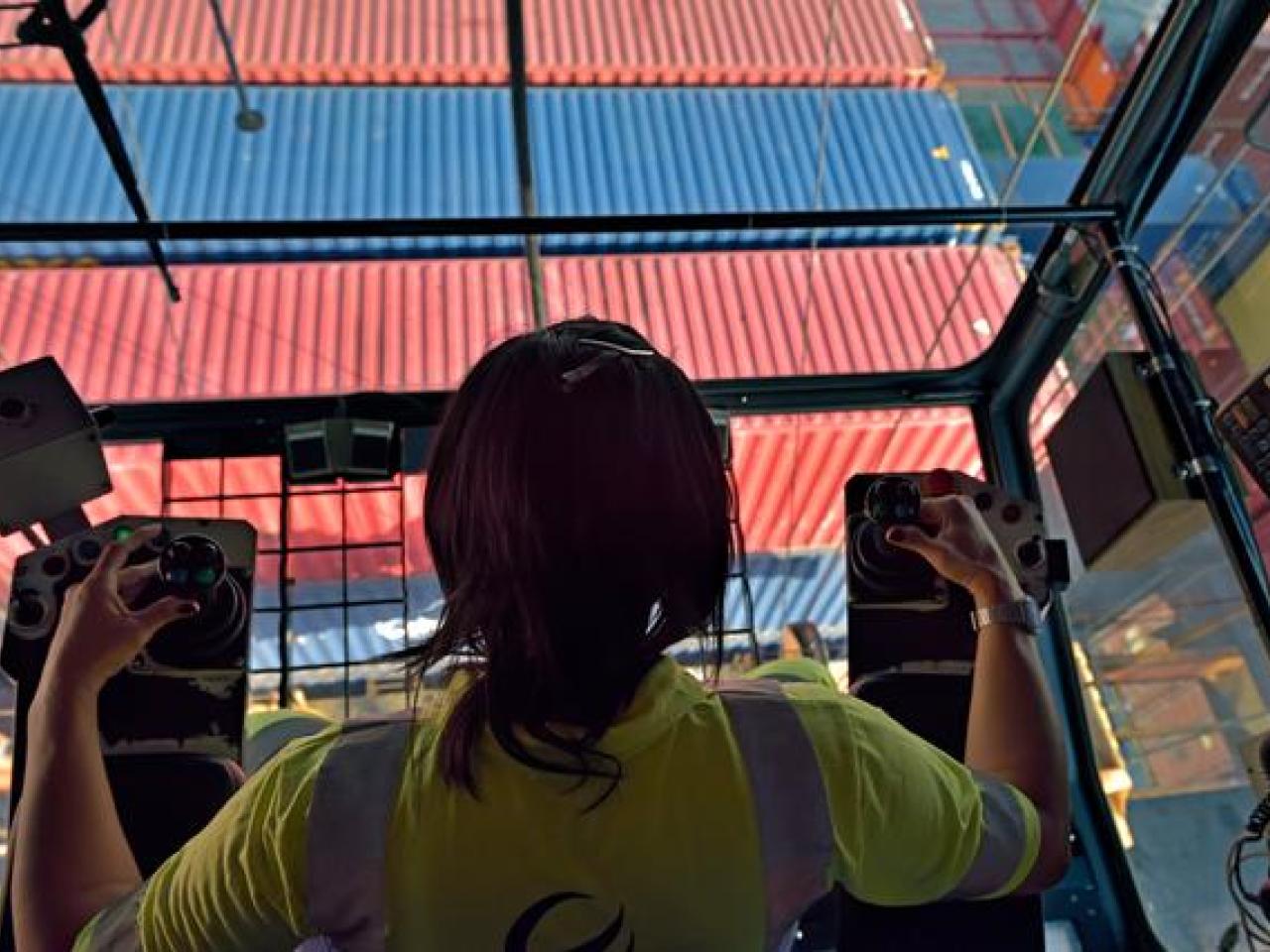 Employee operating crane