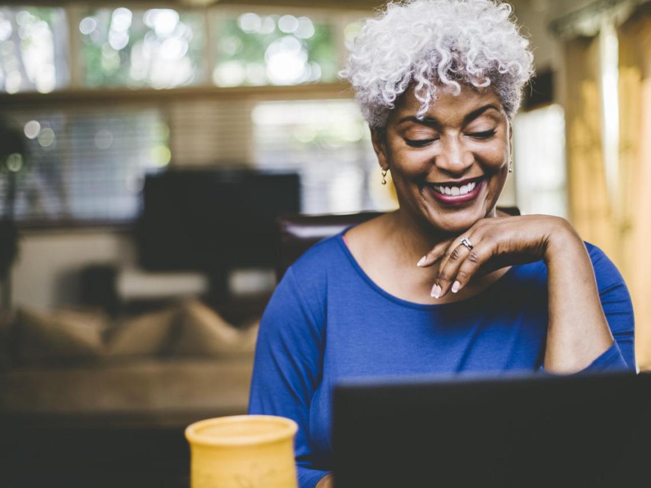 Women looking down at laptop