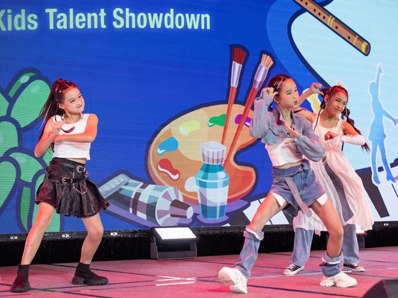 Children dancing on stage at the Kids Talent Showdown