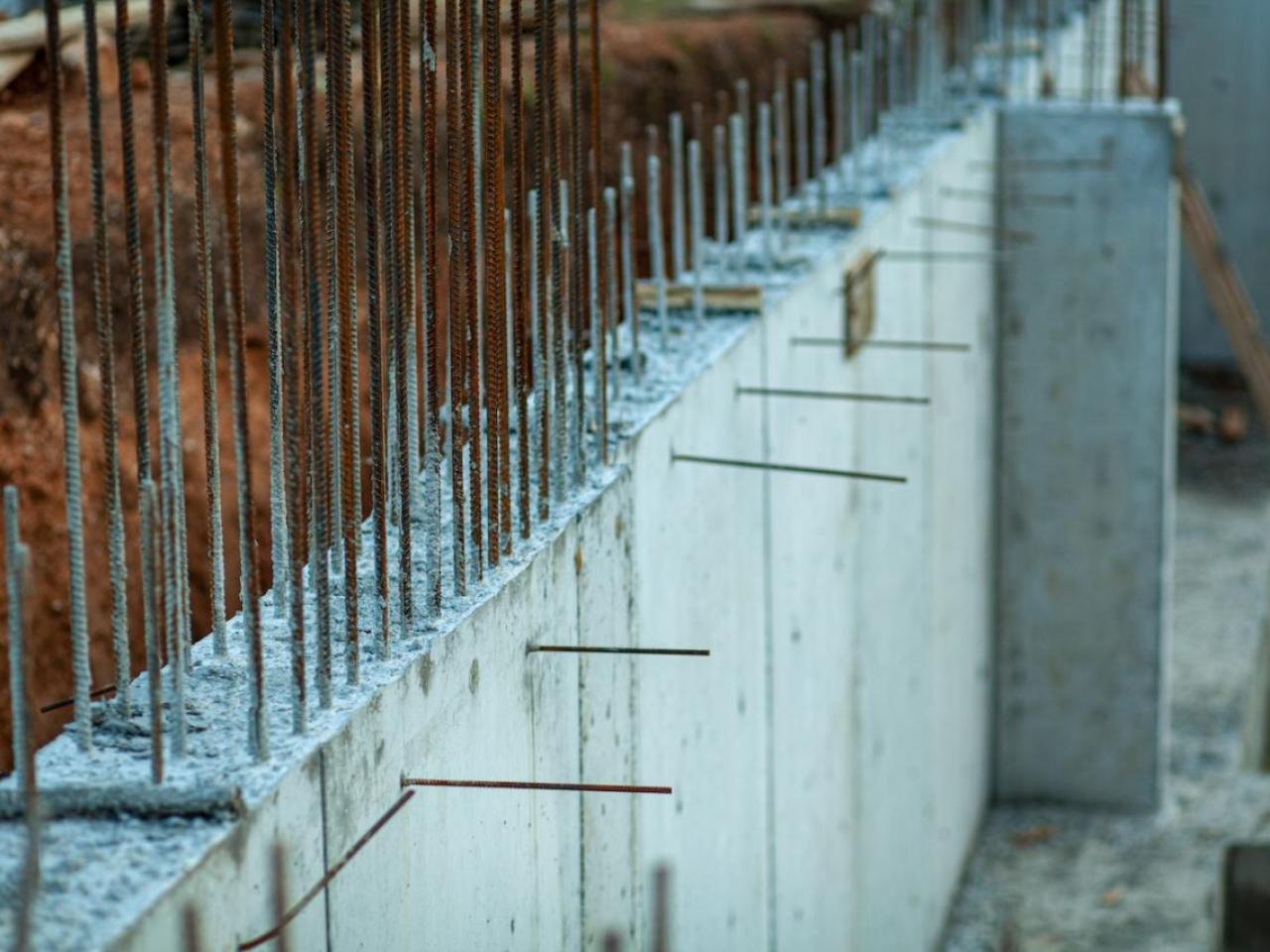 Steel bars poking out from cement