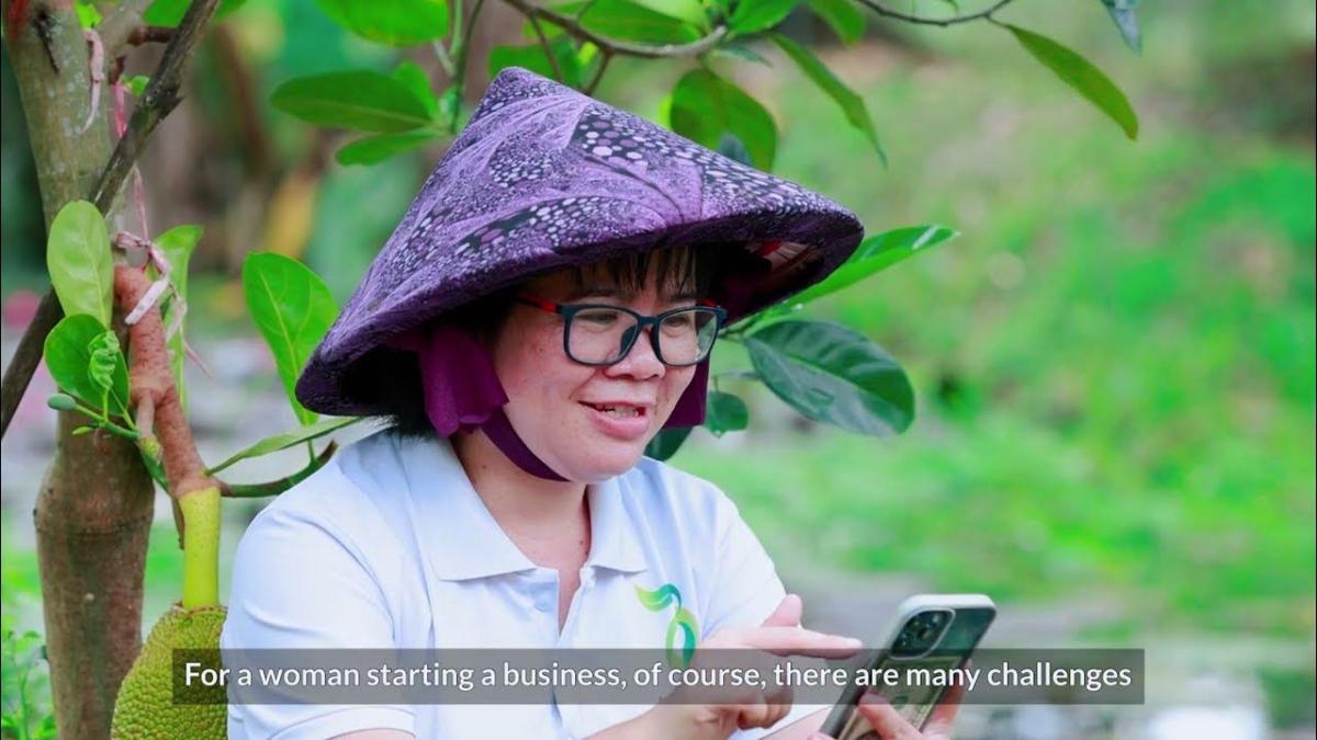 Woman typing on smart phone