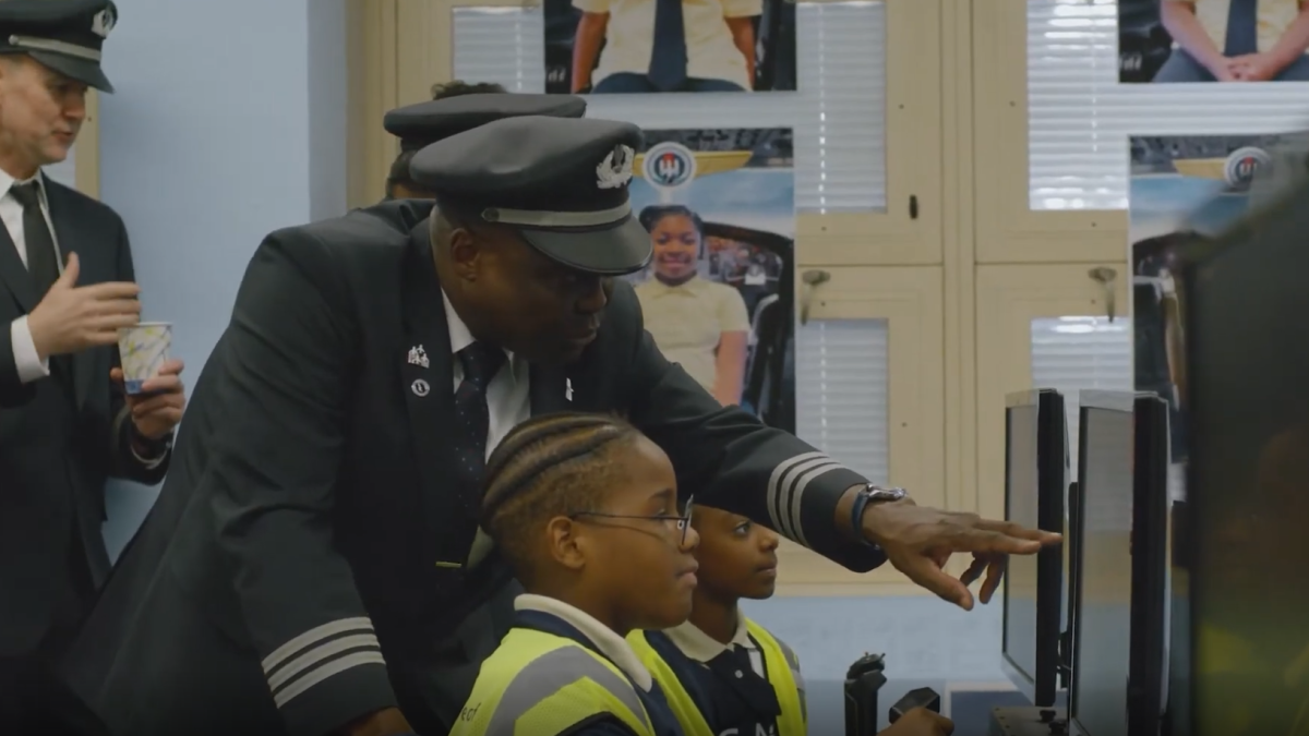 Pilot teaching a young student