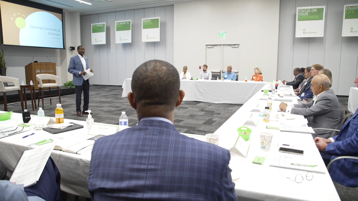 People sat around a table during the second annual CDFI Convening