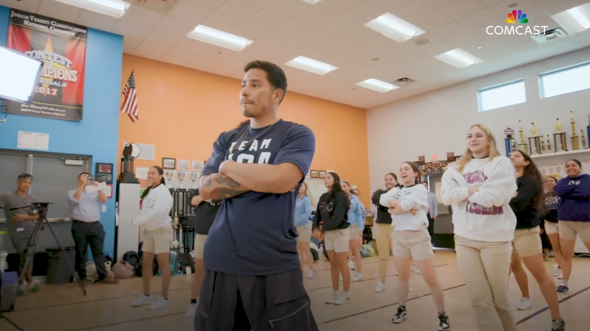 Victor Montalvo teaching a class of student dance moves.