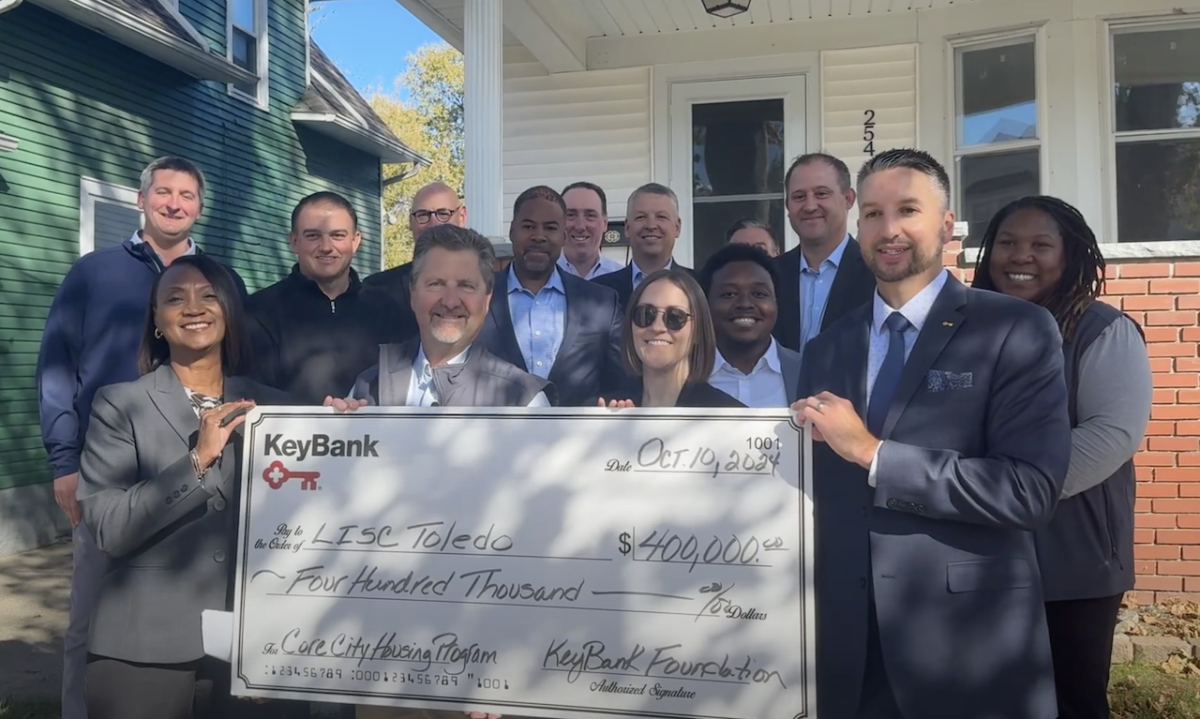 LISC and KeyBank Leadership shown with the $400,000 grant check.